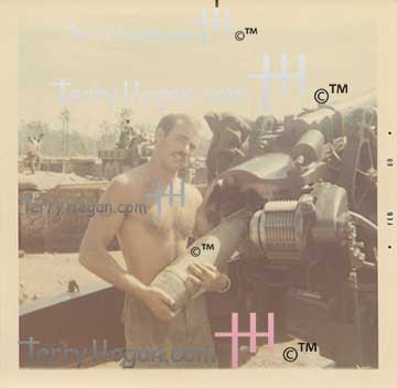 Rare Polaroid snapshot from 1969 Vietnam: Artilleryman loading a ninety-eight-pound explosive projectile.